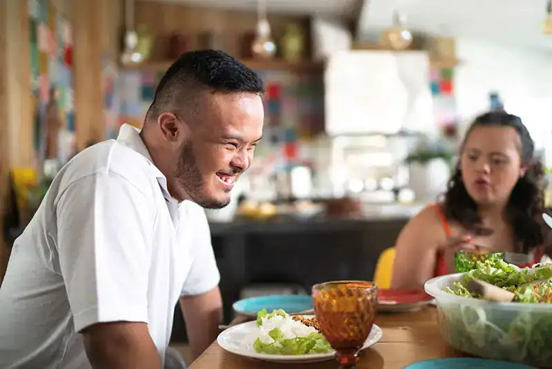 Empowering Weight Loss: A Comprehensive Guide for Individuals with Disabilities 2 Image of a disabled man and balance around nutrition to aid weight loss Livingston