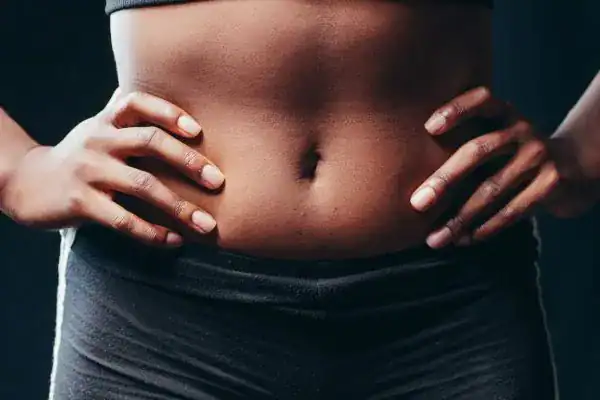 Toning Your Stomach: The Ultimate Guide to Achieving a Sculpted Stomach While Shedding Pounds 1 Image of a toned stomach after non surgical treatment Livingston